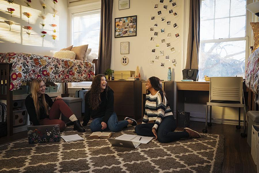 Students sitting in a residence hall